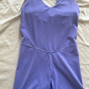 Purple lululemon romper size 6. Like new - used / washed 2-3 times.